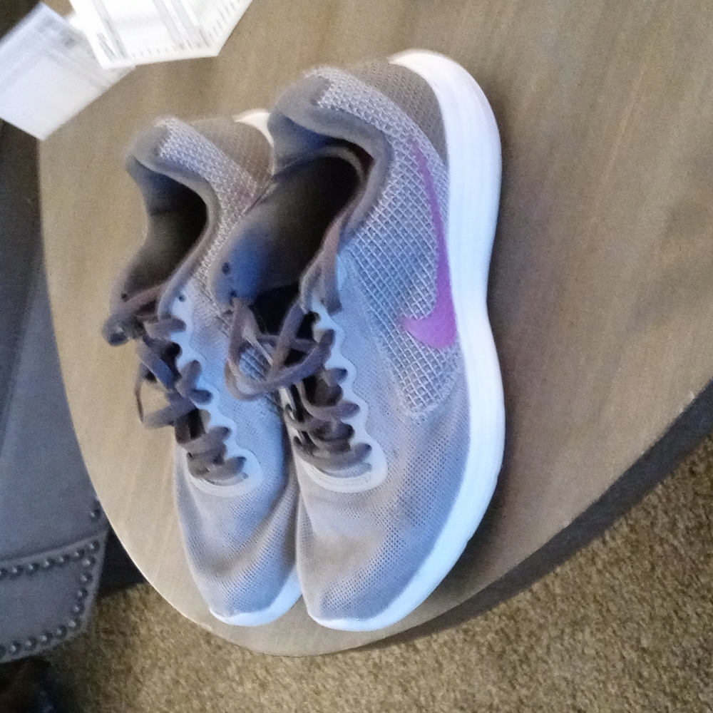 Gray with purple nike sign size 6.5